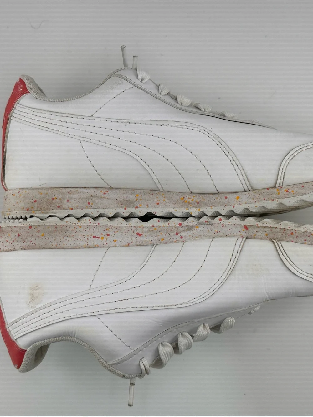 Puma Kids White Low-Top Sneakers with Gold Logo and Speckled Sole